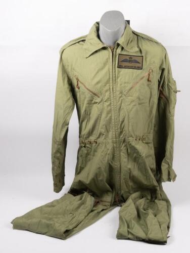 157 · PILOT JUMPSUIT: A 1968 R.A.A.F pilot jumpsuit, size 3, by M.Pennisi, RAAF cloth patch to left chest and No.77 Squadron cloth patch to right shoulder