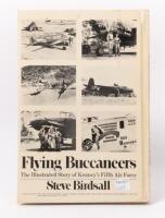 FLYING BUCCANEERS: A hardcover book of the 'Flying Buccaneers - The Illustrated Story Of Kennys Fifth Air Force' by Steve Birdsall, published by Doubleday & Company, Inc. 1977 - 2