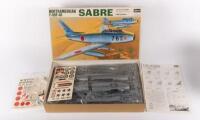 MODEL KIT: A 1/72 scale Hasegawa Hobby Kits model includes a 'North American F-86 F-40 Sabre'