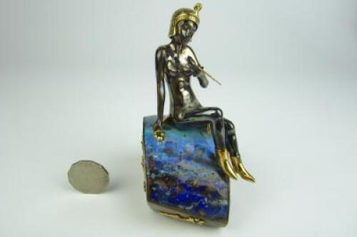 EGYPTIAN: An impressive Stirling Silver and 18 carat yellow gold sculpture of 'The Snake Charmer'