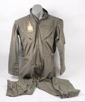 PILOT JUMPSUIT: A R.A.A.F pilot jumpsuit, size 42L, by M.Pennisi, black & blue stripes to both shoulders, No.11 Squadron cloth patch to right chest, manufacturer unknown