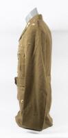 OFFICERS JACKET: A military dress jacket thought to be an ADF officers dress jacket, labelled 'JAMES' above right pocket, four pocket, four buttons, made by Evers & Cohen Sydney - 2