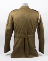 OFFICERS JACKET: A military dress jacket thought to be an ADF officers dress jacket, labelled 'JAMES' above right pocket, four pocket, four buttons, made by Evers & Cohen Sydney - 3