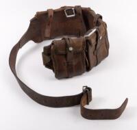 AMMUNITION BELT: An ammunition brown&nbsp;leather belt, five pockets