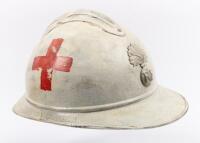 FRANCE WWI: A French WWI era 'Adrian Helmet' medical version, 'RF' badge to front, white with red crosses