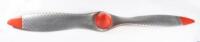 PROPELLER: An metal aeroplane propeller with wooden red painted hub, overall length 2.2m