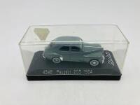 PEUGEOT: A 1:43 scale model by Solido of the 1954 203, in original packaging [Location: Sydney] - 3