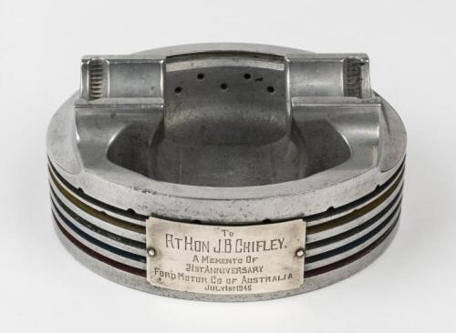 PRIME MINISTER CHIFLEY/FORD AUSTRALIA: A large & important commemorative upturned cast alloy piston presentation desk piece