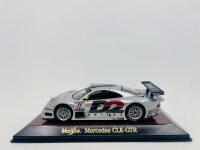 MERCEDES-BENZ: A 1:43 scale model by Maisto&nbsp;of the Mercedes-Benz CLK-GTR, complete with original packaging [Location: Sydney]