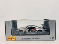 MERCEDES-BENZ: A 1:43 scale model by Maisto&nbsp;of the Mercedes-Benz CLK-GTR, complete with original packaging [Location: Sydney] - 7