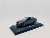 MERCEDES-BENZ: A 1:43 scale model by Schuco of the Mercedes-Benz C63 AMG, limited edition 1 of 1000, complete with original packaging [Location: Sydney] - 2