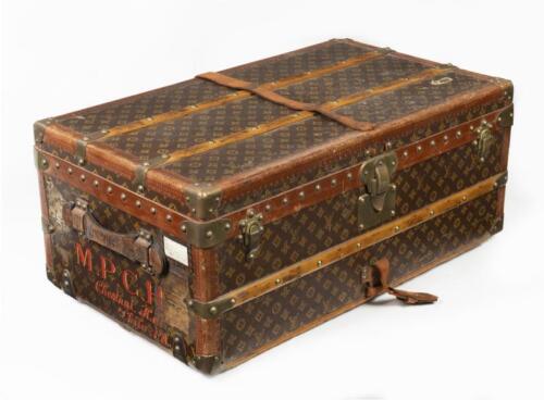 6 · LOUIS VUITTON: An early 20th century Louis Vuitton cabin trunk, monogram print, timber lined with brass hardware, 33cm high, 81cm wide, 47cm deep