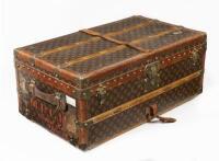 LOUIS VUITTON: An early&nbsp;20th century Louis Vuitton cabin trunk, monogram print, timber lined with brass hardware, 33cm high, 81cm wide, 47cm deep