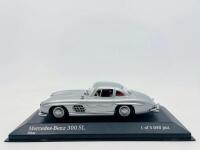 MERCEDES-BENZ: A 1:43 scale model by Minichamps of the Mercedes-Benz 300 SL, limited edition 1 of 5,040&nbsp;pieces, complete with original packaging [Location: Sydney]&nbsp;