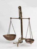 SCALES: Antique large brass weighing scales together with weight set (75.5cm high)