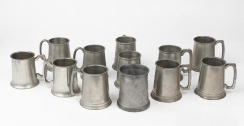 TANKARDS: A dozen pewter tankards. Circa 1950's