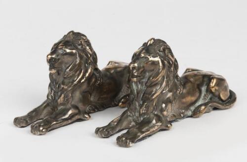 LIONS: A pair of silver-plated decorative lions
