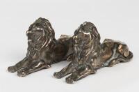 LIONS: A pair of silver-plated decorative lions