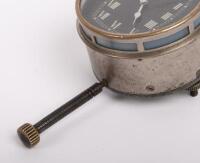 JAEGER: An early and rare Jaeger car clock, with white Roman numeral numbering on a black face, 8cm in diameter - 3