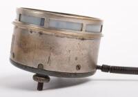 JAEGER: An early and rare Jaeger car clock, with white Roman numeral numbering on a black face, 8cm in diameter - 5