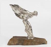 ROLLS-ROYCE: A Spirit of Ecstasy mascot by Sykes on petrified timber base - 2