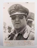 GENERAL MACARTHUR: A press photo of General Douglas MacArthur taken in South Korea, June 29, 1950, with stamp and written information to reverse