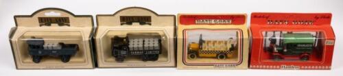 STEAM WAGONS, HAMLEYS TRUCK, TAXI CAB: Four 1:43 scale Days Gone models including a 1935 S6 Sentinel Steam Wagon Tarmac Limited, 1931 Sentinel Steam wagon Duxford, Hamleys Model T Truck and a Taxi Cab