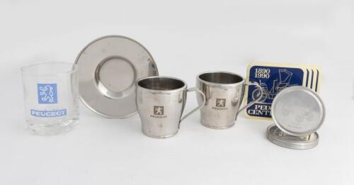 PEUGEOT: A collection of Peugeot Ware. Cups and Saucers, Drink Coasters, Glass
