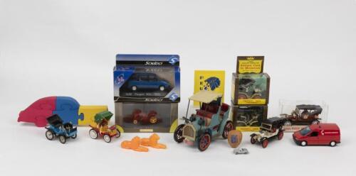 PEUGEOT: A quantity of Peugeot model cars, puzzles, whistles