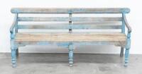 BENCH: A large rustic timber hardwood garden seat, 209cm wide, 89cm high, 71cm deep