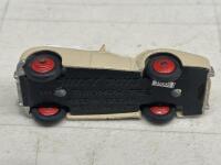 TRIUMPH TR2: A&nbsp;Dinky Toys&nbsp;Triumph TR2 model, made in England by Meccano Ltd, this model has been repainted and the chassis removed and replaced, non genuine rivets&nbsp;[UPDATED DESCRIPTION] - 4