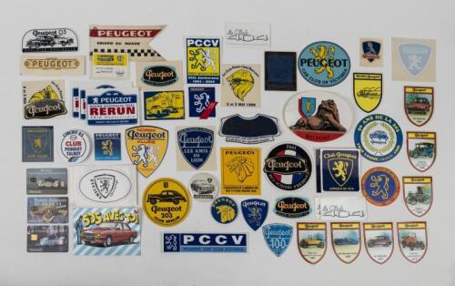 PEUGEOT: A quantity of Peugeot Badges, Stickers, Telephone Cards