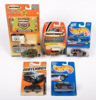 MODELS: A group of five Matchbox and Hot Wheels 1:64 scale models in original packaging