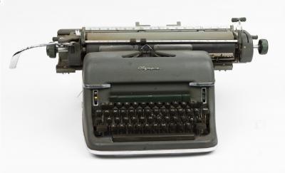 OLYMPIA TYPEWRITER: An Olympia Wilhelmshaven SM 3 typewriter in olive green. Circa 1956