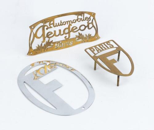FRENCH BADGES: Three French badges. Paris and Peugeot brass badges