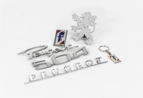 PEUGEOT: A group of Peugeot 504 car badges and Pininfarina key rings