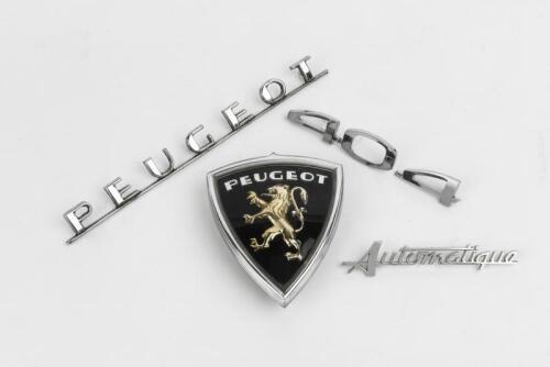 PEUGEOT: Four Peugeot 404 car badges