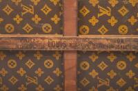 LOUIS VUITTON: An early&nbsp;20th century Louis Vuitton cabin trunk, monogram print, timber lined with brass hardware, 33cm high, 81cm wide, 47cm deep - 13