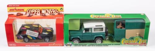 LAND ROVER: Two Land Rover models in boxes