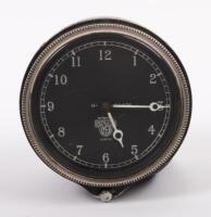 SMITHS: An English Smith's front wind car clock for dash, diameter of full face 9cm, beveled glass diameter of 7.5cm, stamped 'H- 86.578' to face