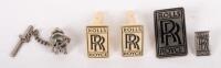 ROLLS-ROYCE: A group of four small Rolls-Royce worn accessory items each displaying the 'RR' insignia