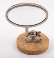 MIRROR: A J. Neale & Sons Birmingham oval shaped mirror, thought to perhaps be either an adjustable interior rear view or side mirror, lens 11.cm wide