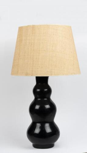 LAMP: A large triple gored lamp with raffia style shade
