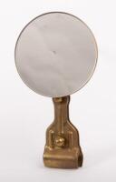 MIRROR: A brass side mirror with clamp style fitting, 24cm high, lens diameter 12.5cm&nbsp;