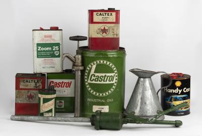 GARAGENALIA: A collection of miscellaneous oil cans. B.P, Caltex, Castrol oil cans