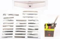 SHADOW II: A group of assorted Rolls-Royce Silver Shadow II chrome trim pieces and grille parts
