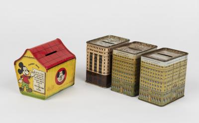 MONEY BANKS: A small collection of tin money banks