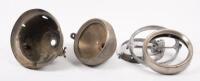 AUTOJUMBLE: An autojumble lot including an early incomplete headlamp&nbsp;and headlamp parts such as inner lamp casing and outer ring surrounds