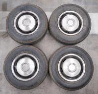 SILVER SHADOW: A set of four circa 1970s Rolls Royce Silver Shadow 15 inch wheels with tyres, wheel rings and hubcaps