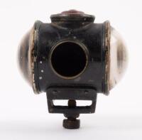LAMP: An early small three lens 'helmet' lamp with mounting bracket and bolt, 10cm high, 10cm wide